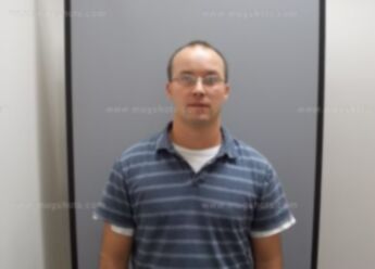 Timothy J Micolichek
