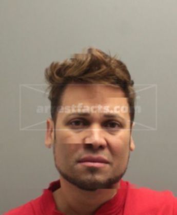 Carlos J Torres