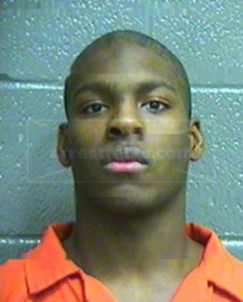 Travis J Estis