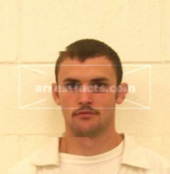 Aaron M Shores