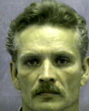 Gary L Adkison