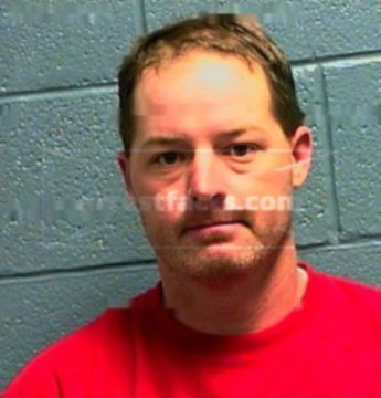 Justin Wayne Hughes