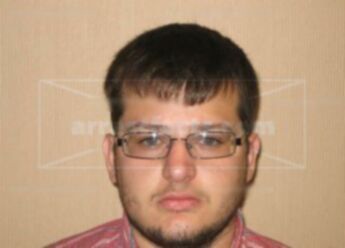 Justin Thomas Mikusek
