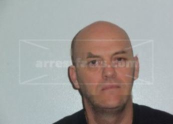 Mark E Moore