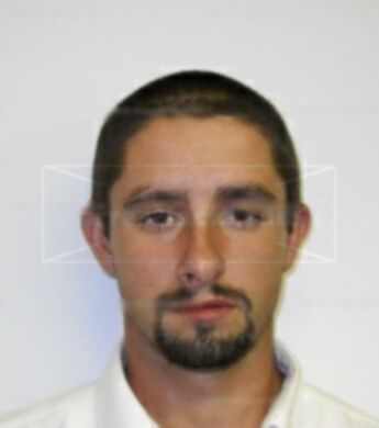 Travis L Sneed