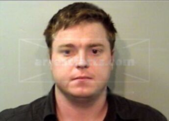 Christopher R Benson