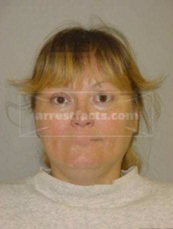 Christine E Wicks