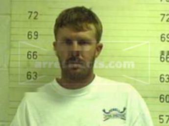 Gregory A West