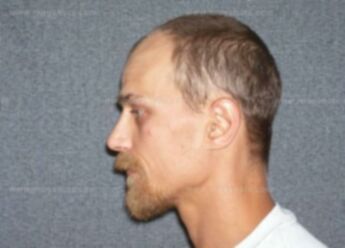 Travis L Tennant