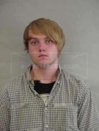 Aaron J Voshell