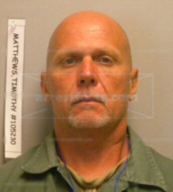 Timothy J Matthews