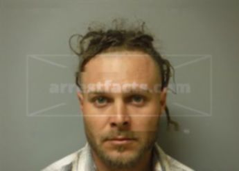 Justin D Cooper