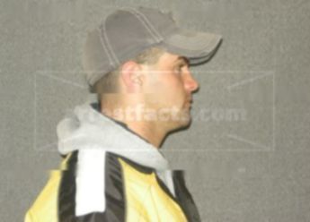 Travis W Dalluge