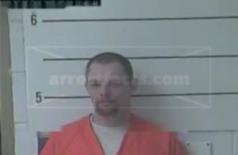 Nicholas D Adams