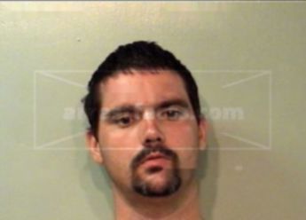 Clinton J Coker