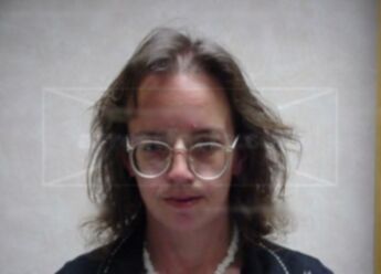 Theresa M Riley