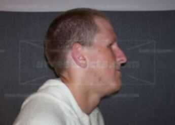 Travis J Moss