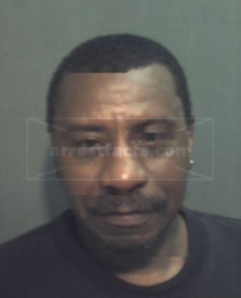 Curtis J Woods
