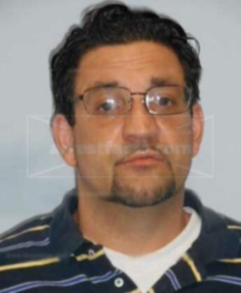 Travis L Howenstine