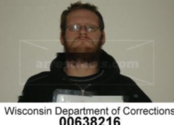 Brett J Faust