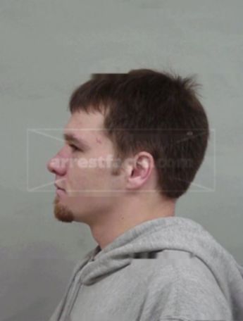 Travis D Olver