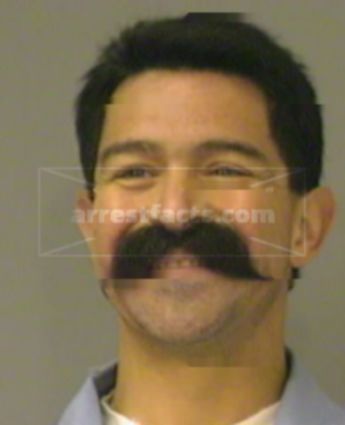 Thomas M Flores