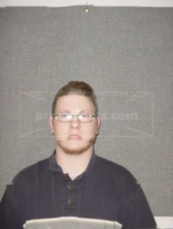 Adam D Busack