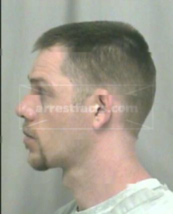 Adam K Dennis