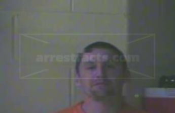 Travis J Riggs