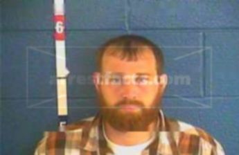 Justin K Young