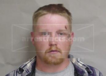 Travis M Hill