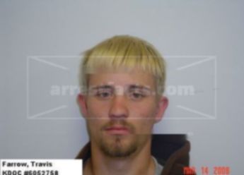 Travis L Farrow