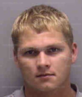 Justin L Polk