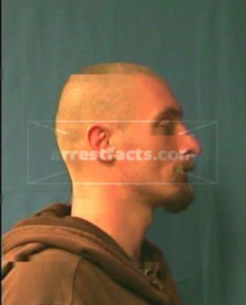 Travis W Rhines