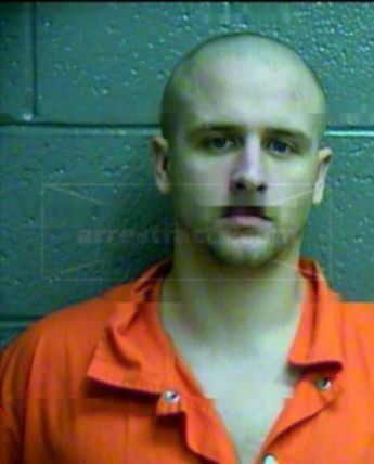 Travis J Merritt