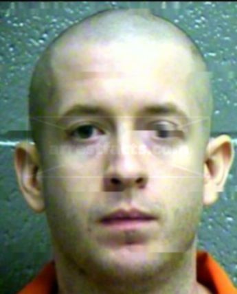 Aaron T Hughes