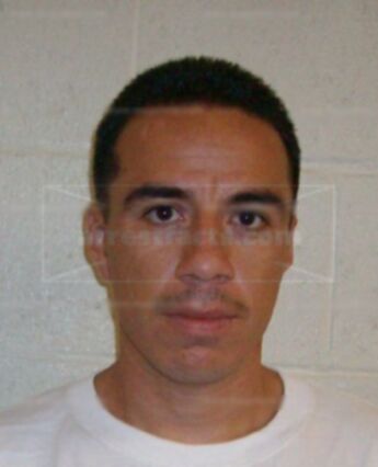 Adam L Flores