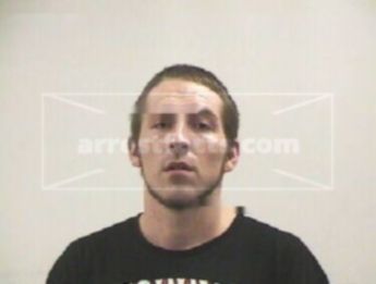 Travis J Manning