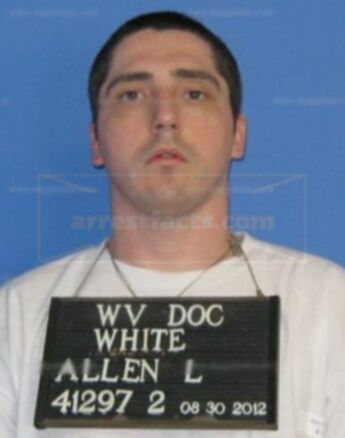 Allen L White
