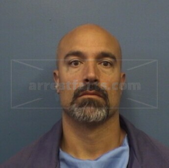 Anthony J. Carev