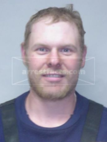 Justin K Kolm