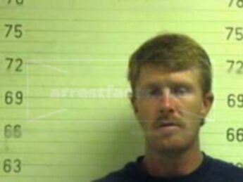 Gregory A West