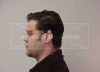 Aaron M Baumann