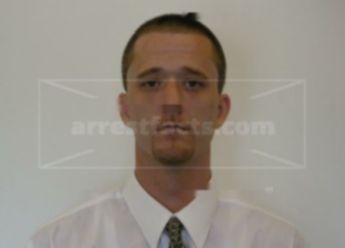 Adam L Buhler