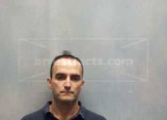 Travis B Walton