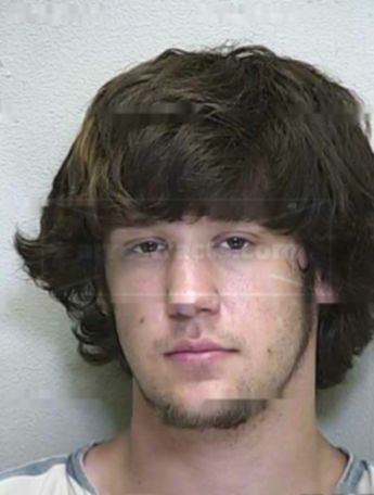 Travis L Rutherford