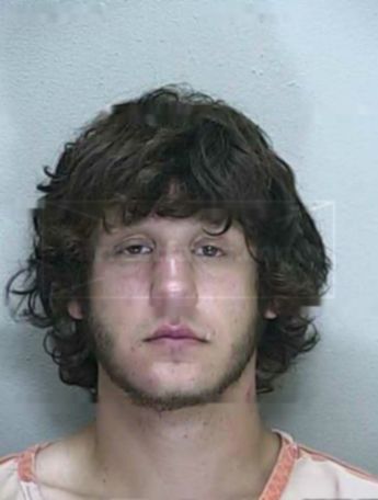 Travis L Rutherford
