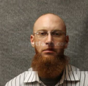 Kyle L Schmutzler