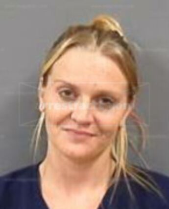 Traci Mae Butzine