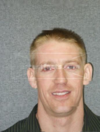 Joshua G Tracy